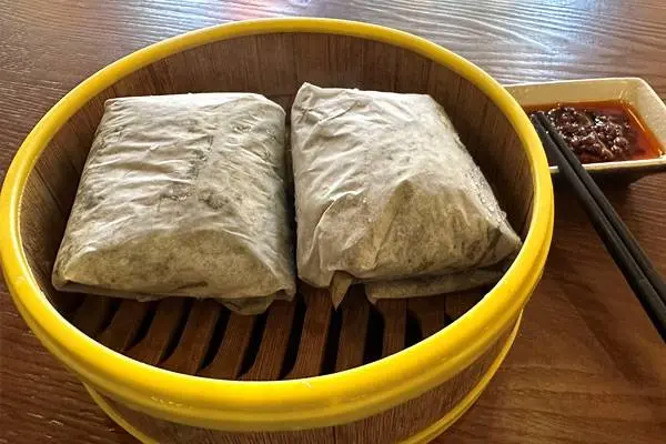 bao - Steamed Sticky Rice Wrapped in Lotus Leaves (2 pcs)