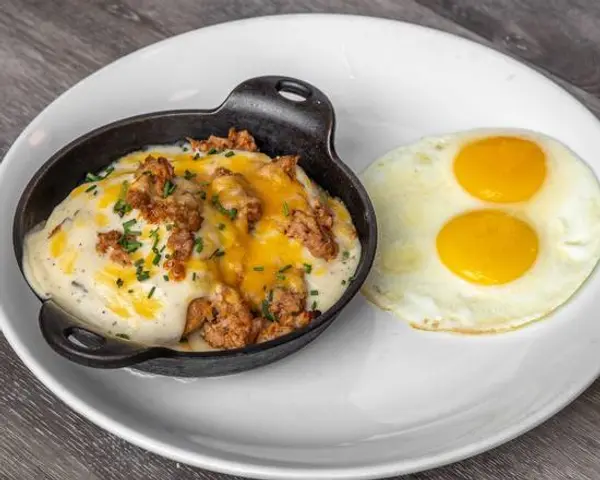 bread-and-ink-cafe - Biscuit and Sausage Gravy with Two Eggs Your Style