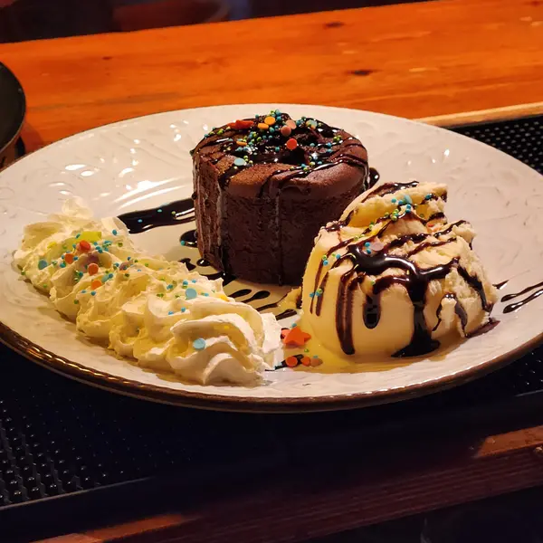 caffe-wine-bar - Chocolate souffle with ice cream