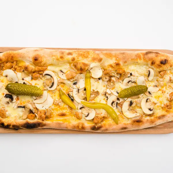 concept-food-cafe-bar - Pastrmajlija with chicken, cheese and mushrooms