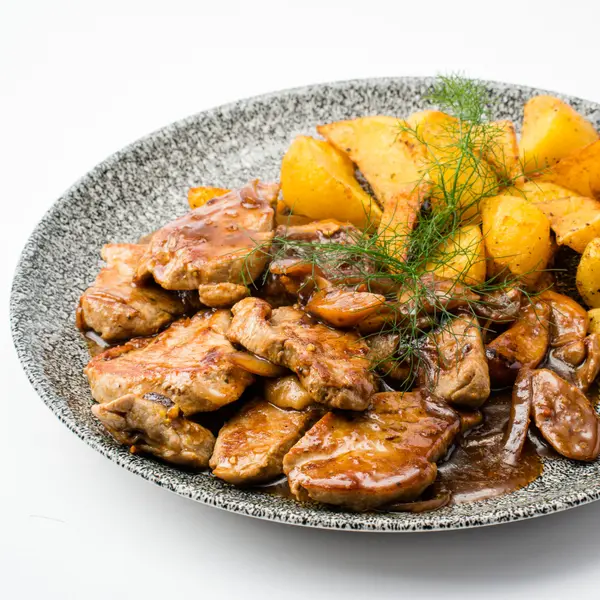 concept-food-cafe-bar - Pork with porcini mushrooms