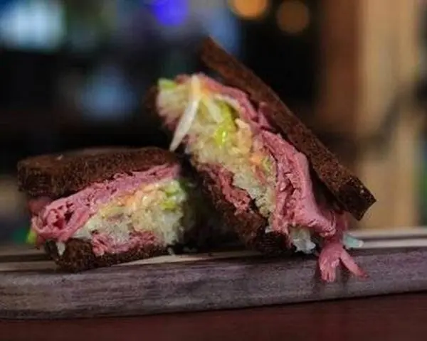 east-side-delicatessen - Pastrami Reuben on Dark Rye Sandwich