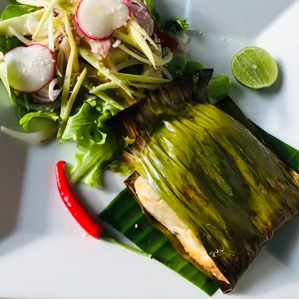 fishermans-restaurant-and-bar - Barracuda Fillet in banana leaf grilled on BBQ with Garden Salad