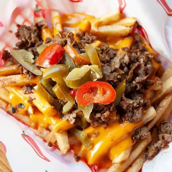 grants-philly-cheesesteak - Cheezy Steak Fries :  w/cheese sauce, steak or chicken breast,sauteed onion and sweet n cherry pe...