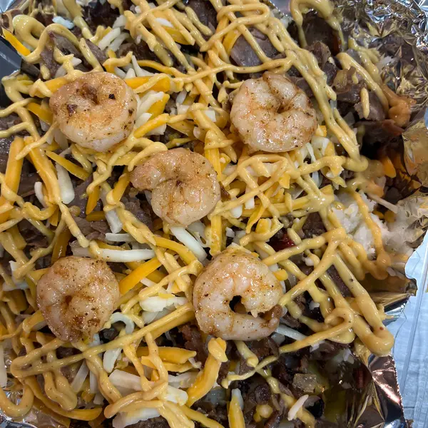 kuntry-fisherman-bar-grill - Shrimp and Steak Loaded Baked Potato