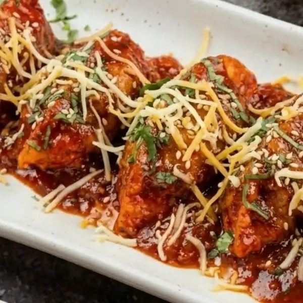 luxury-cafe - chicken cheese pan Fried momo