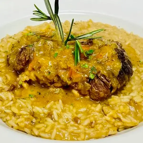 maccheroni-republic - Ossobuco con risotto, sugo ai funghi porcini