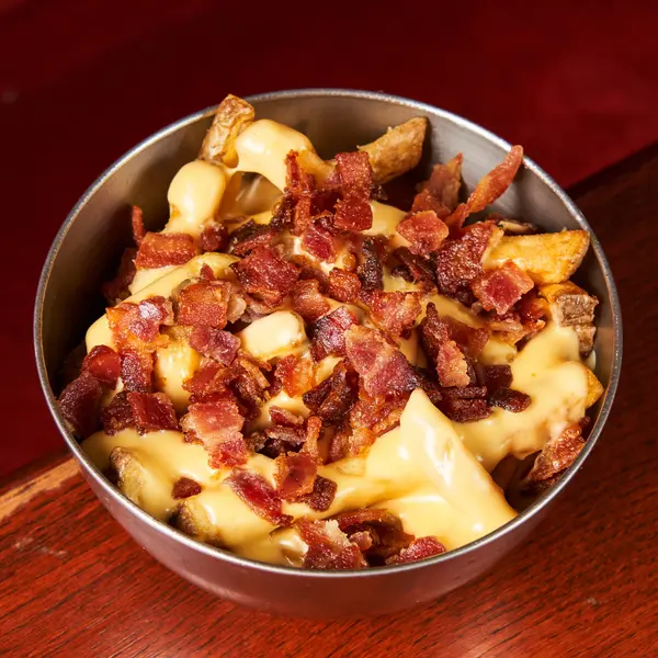 one-one-paris - Cheddar fries and crispy bacon €4 with the burger and €6 to share