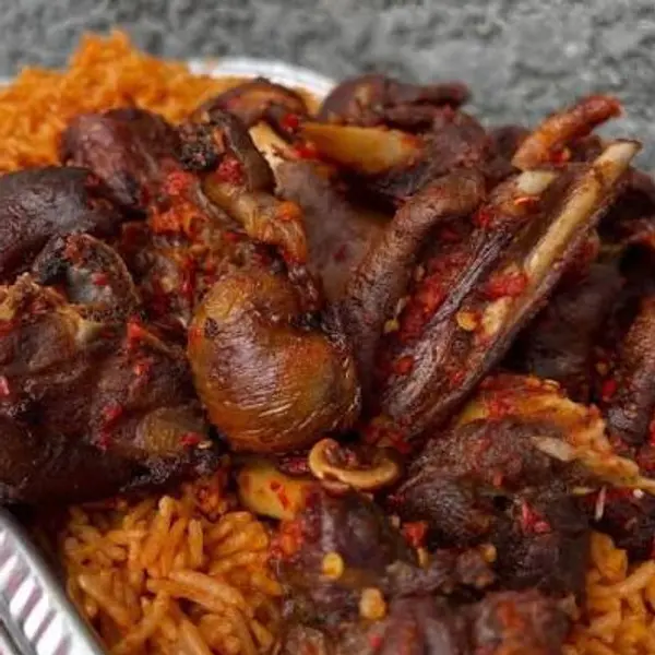 peduase-chop-house - Jollof with Peppered Goat
