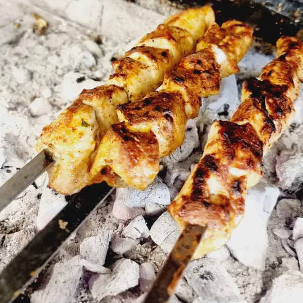 qalaa - Tawook sandwich / سندويش طاووق
