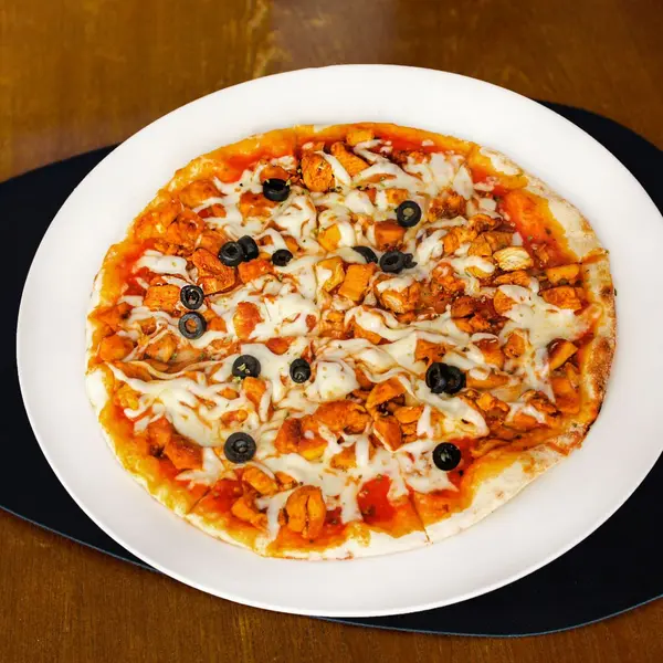 sultana-tunisian-restaurant - Pizza Escalope