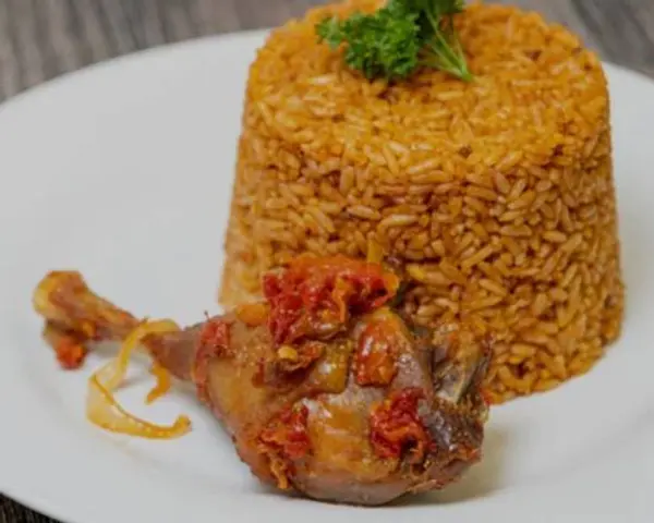 triple-afriq-african-restaurant - Jollof Rice & Chicken Drumstick