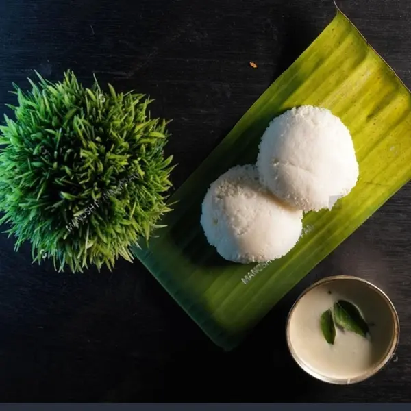 woman-idli - Ghee Idli