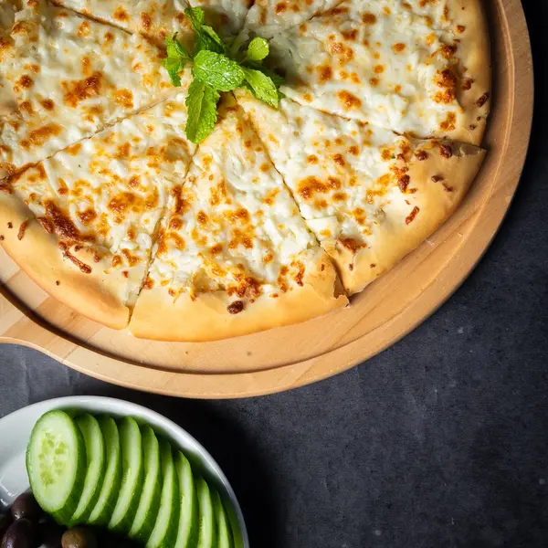 مطعم-السحاب - Manakish Halloumi & Mozzarella Cheese